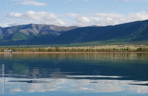 Tranquil lake called the chagytai lake. The mountains are called Tannu-Ola. The Republic Of Tuva, Russia