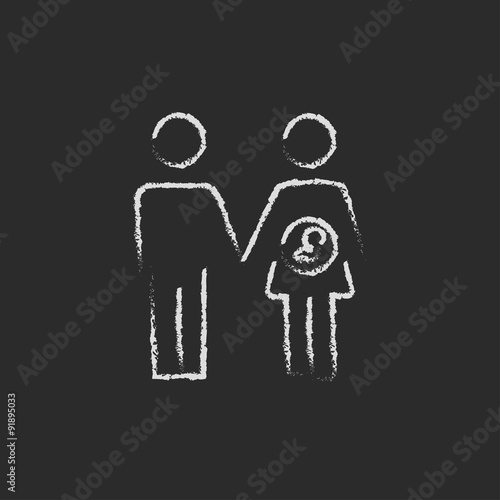 Husband with pregnant wife icon drawn in chalk.