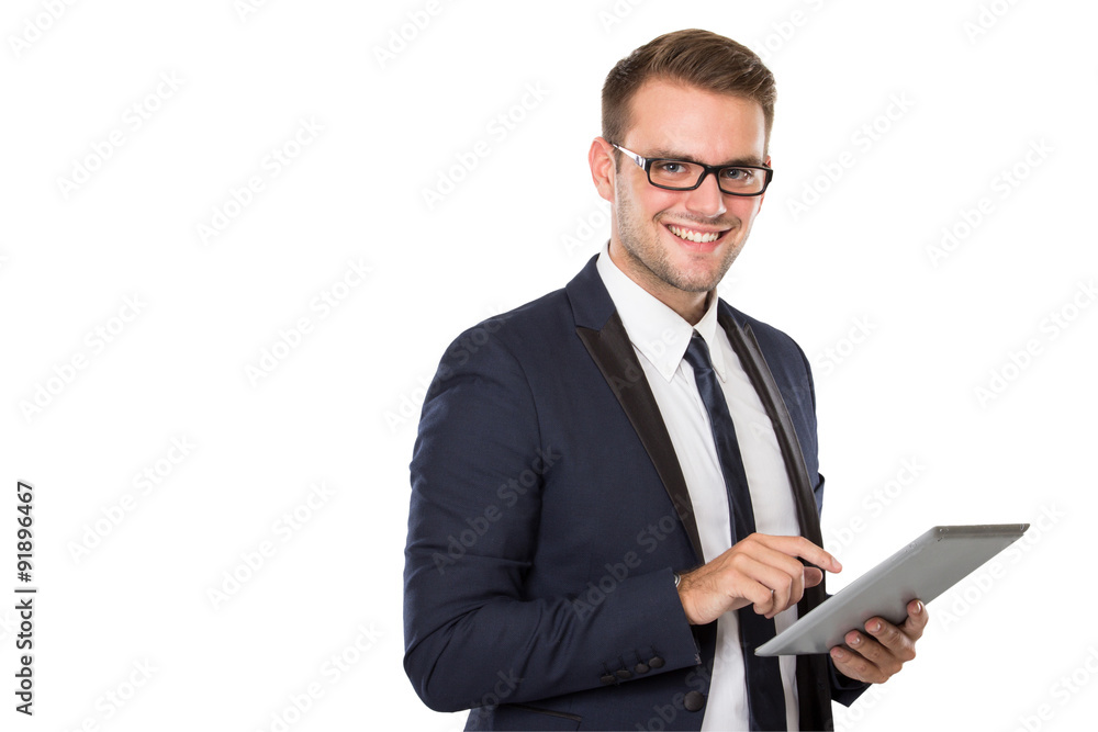 Businessman using a tablet pc, smiling Businessman using a tablet pc, smiling