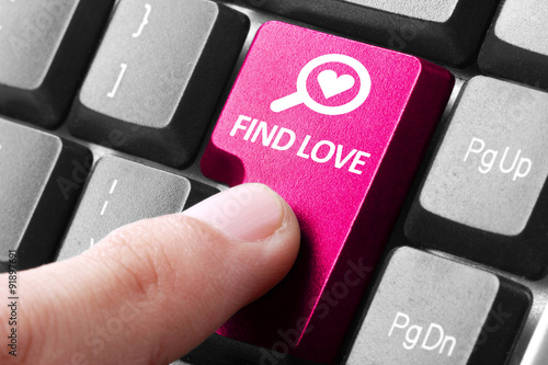 hand press find love button on keyboard photo