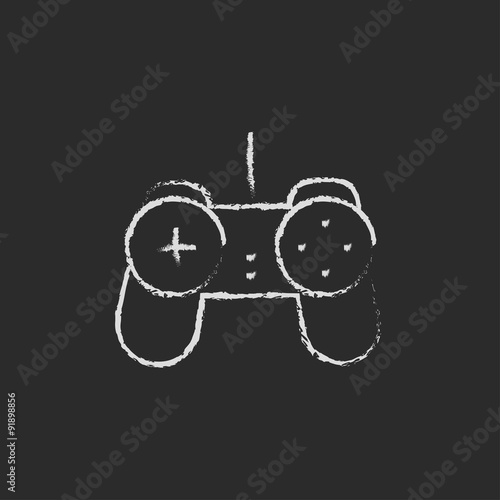 Gamepad icon drawn in chalk.