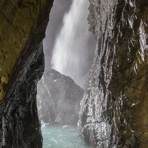 Trummelbach falls (Trummelbachfalle), waterfall in the mountain photo