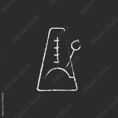 Metronome icon drawn in chalk.