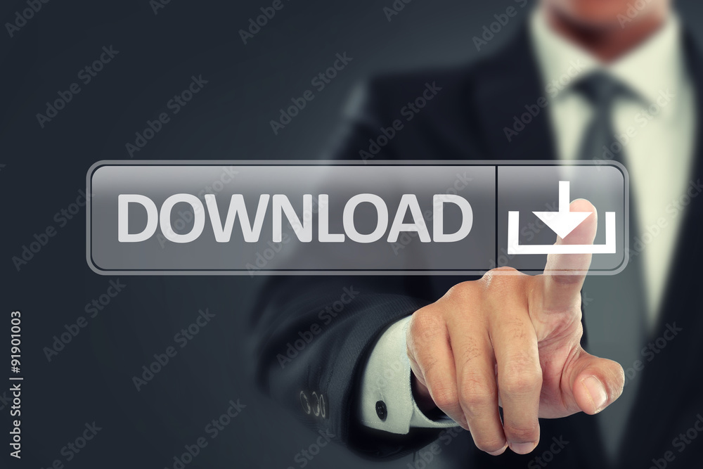 Businessman push to download button on virtual screen Businessman push to download button on virtual screen