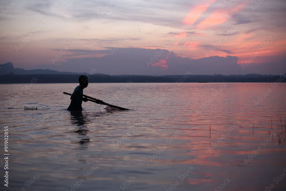 River and Silhouette Fisherman