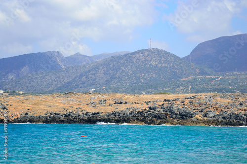 The shores of the Aegean Sea and mountains.