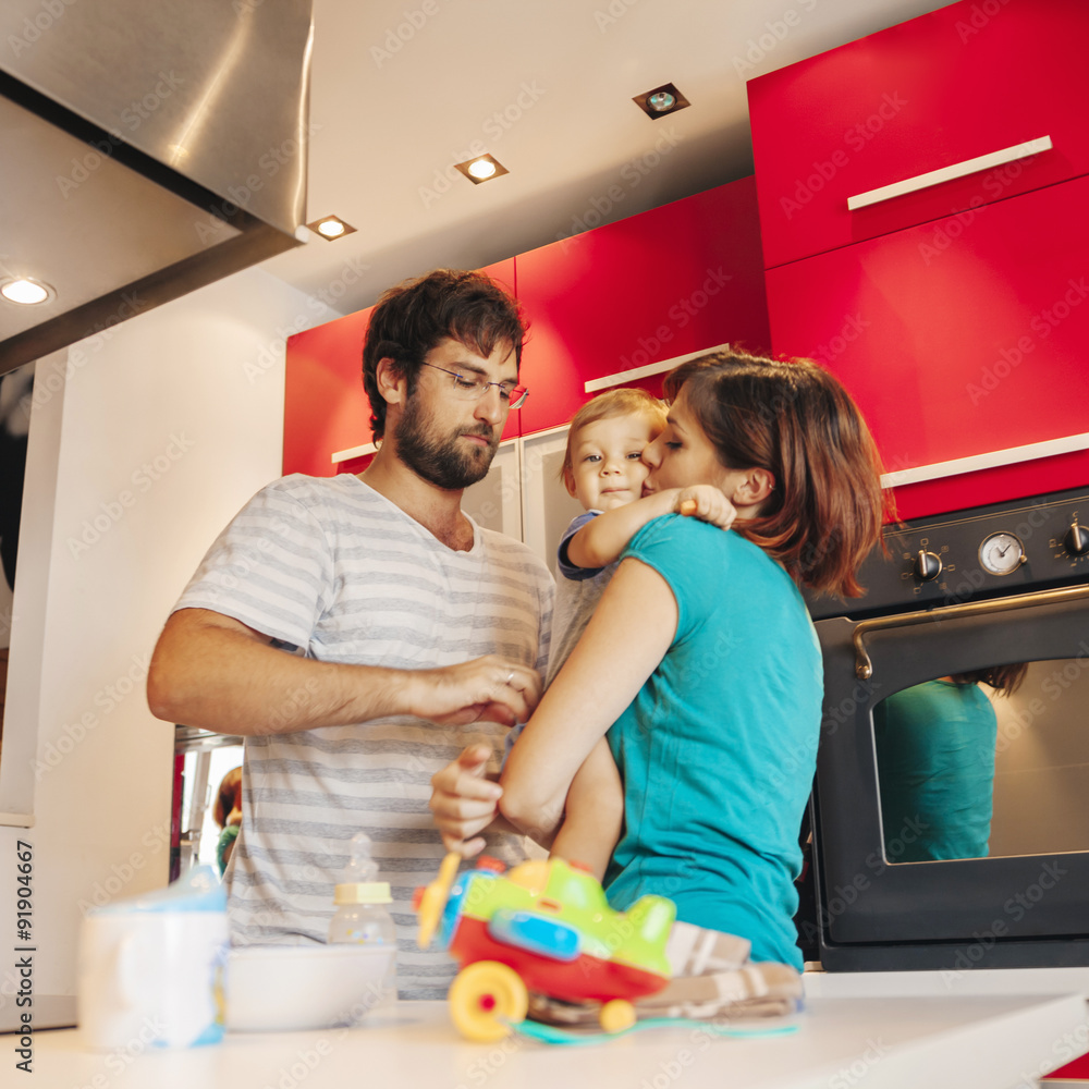 Fototapeta premium Lovely Family In Kitchen