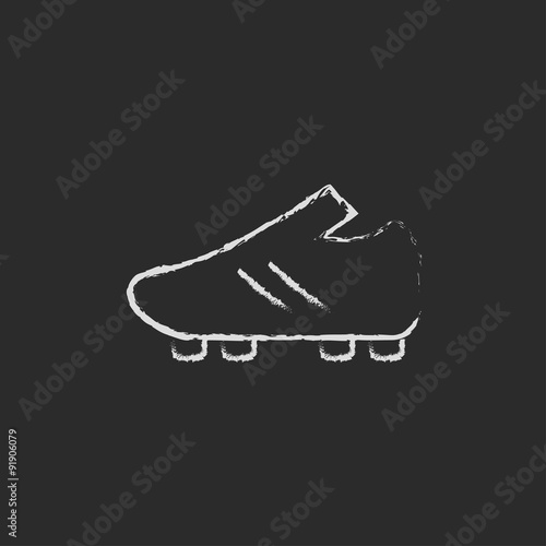 Football boot icon drawn in chalk.