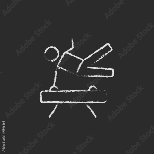 Gymnast on pommel horse icon drawn in chalk.
