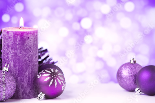 Purple Christmas scene with baubles and candles