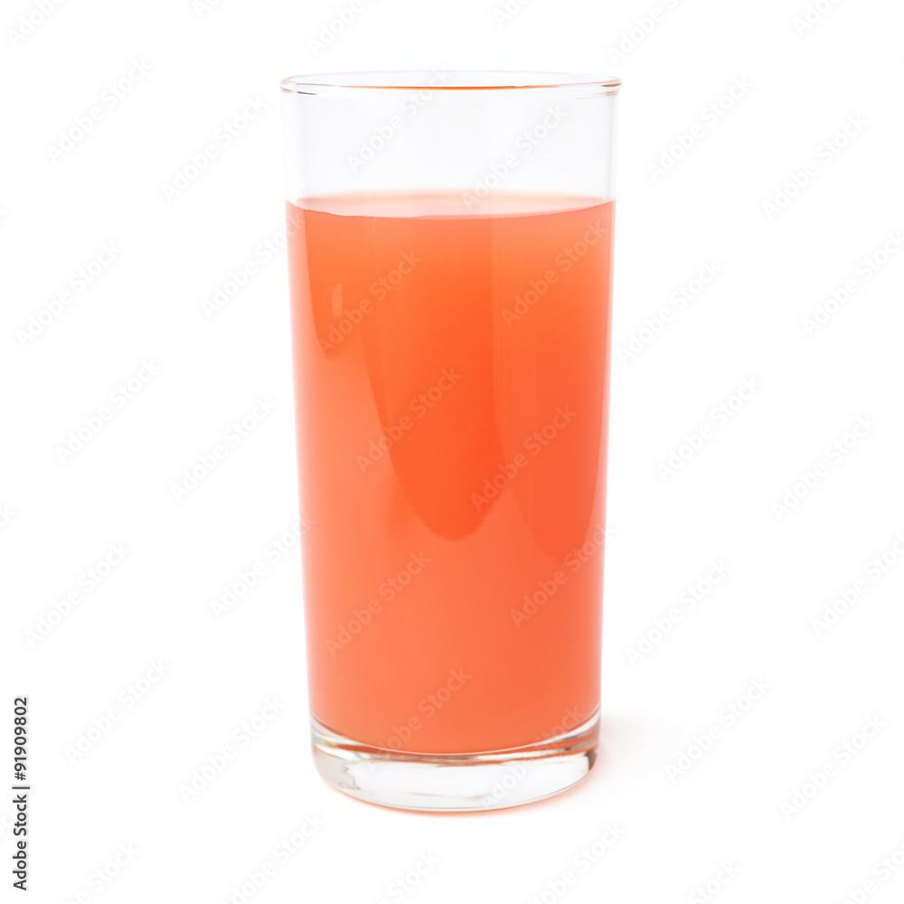 Tall glass filled with the grapefruit juice isolated over the Tall glass filled with the grapefruit juice isolated over the