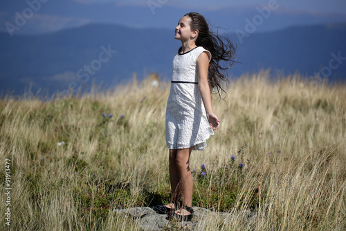 Cute girl in mountains © Volodymyr