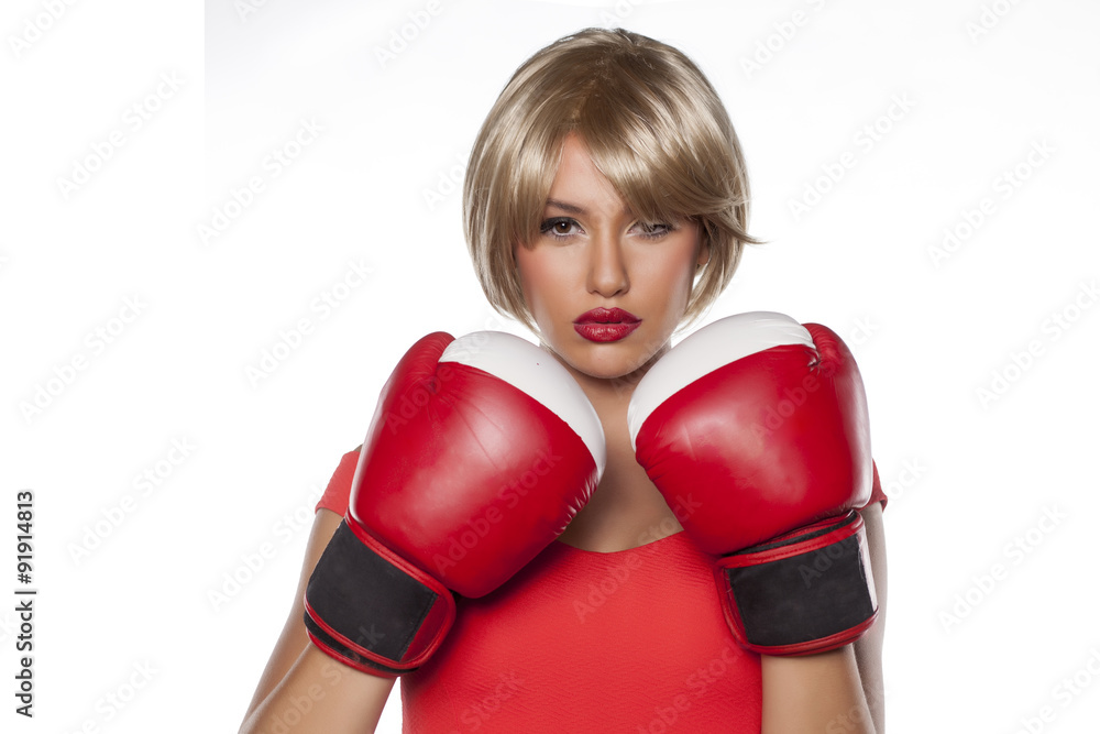 beautiful blonde with short hair posing with boxing gloves beautiful blonde with short hair posing with boxing gloves