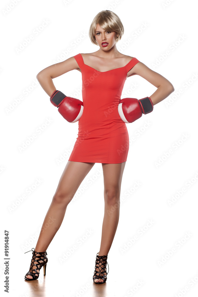 beautiful blonde with short hair posing with boxing gloves beautiful blonde with short hair posing with boxing gloves