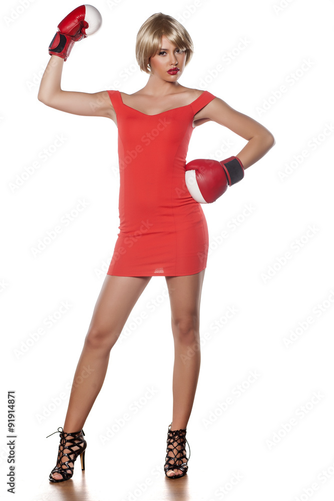 beautiful blonde with short hair posing with boxing gloves beautiful blonde with short hair posing with boxing gloves