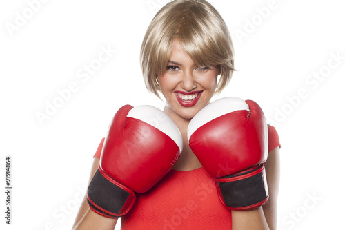 beautiful blonde with short hair posing with boxing gloves © vladimirfloyd