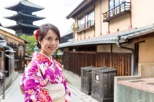 Woman with kimono dress in yasaka pagoda