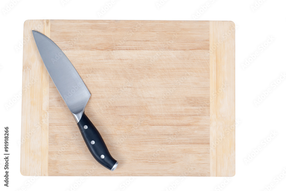 Knife on a wooden chopping board