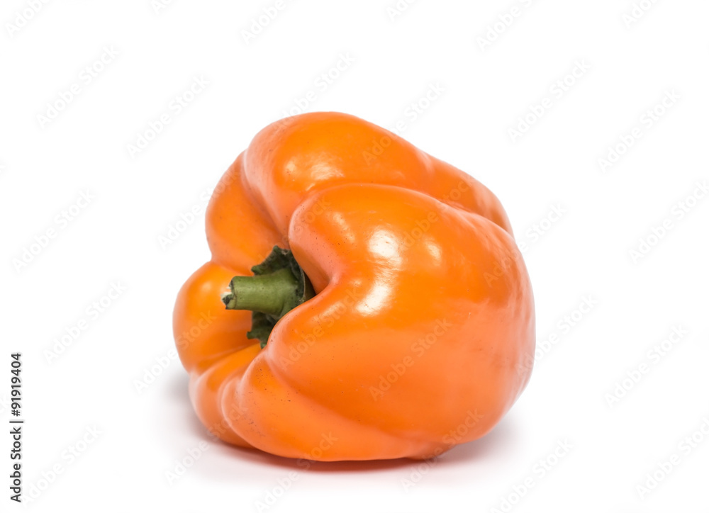 sweet orange paprika (pepper) isolated on a white background. sweet orange paprika (pepper) isolated on a white background.