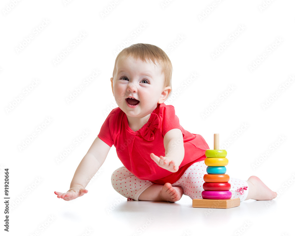 cheerful little girl playing with colorful toy isolated on white cheerful little girl playing with colorful toy isolated on white