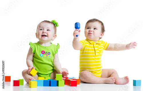 Two adorable babies playing...