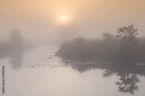 A beautiful foggy sunrise © Dmytro Kosmenko