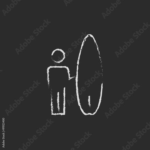 Man with a surfboard icon drawn in chalk.