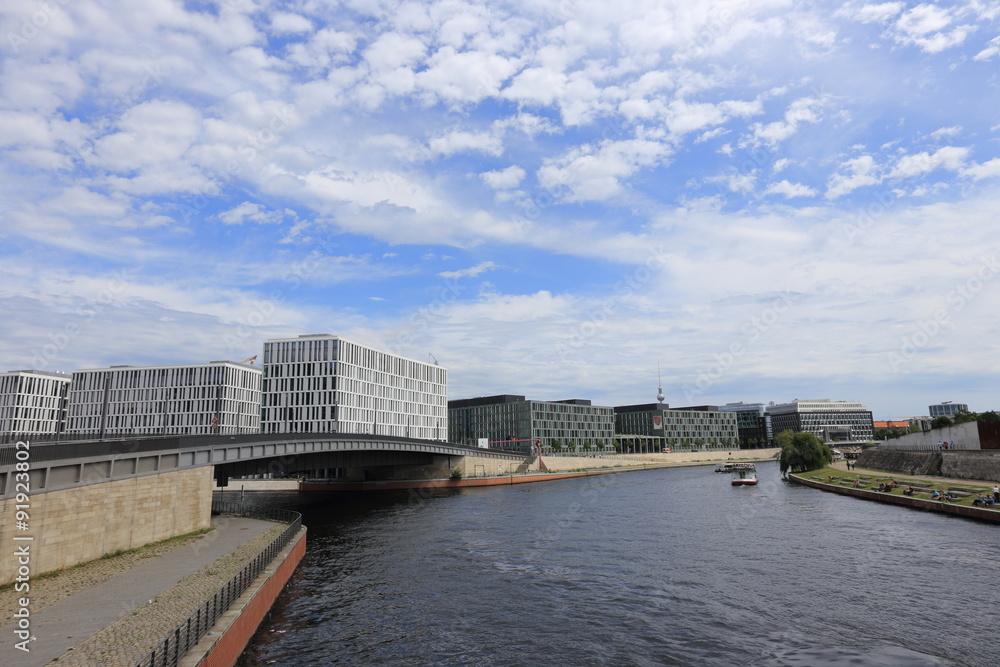 Modern urban landscape with Spree river in Central Berlin, Germany