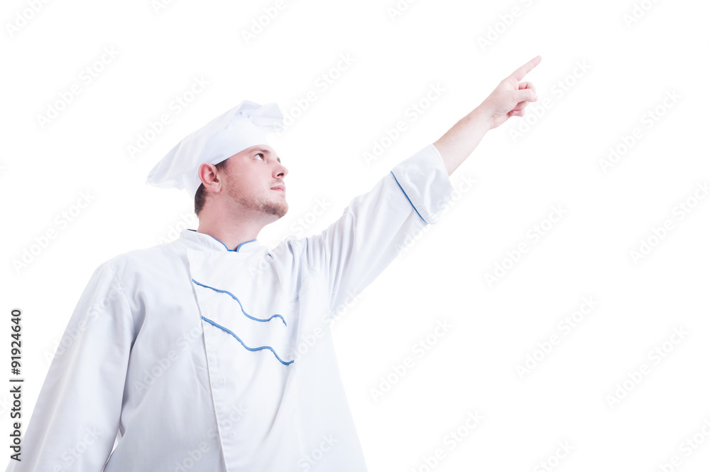 Chef or cook pointing up with index finger Chef or cook pointing up with index finger