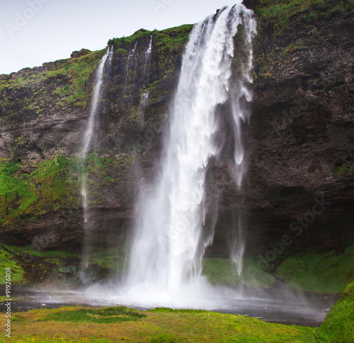Iceland, Seljalandsfoss waterfall in a rainy summer day