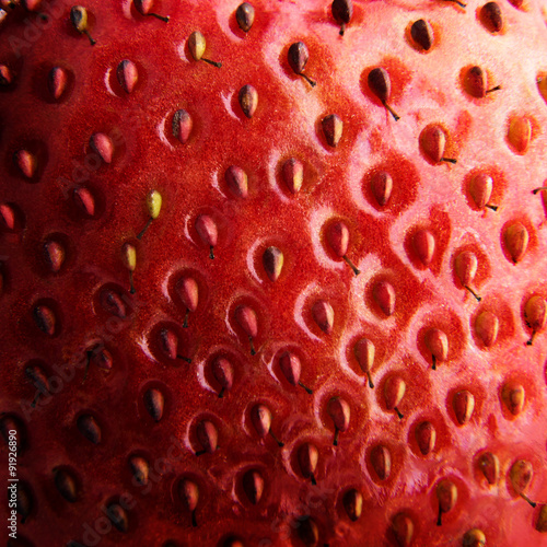 Macro photo of strawberry texture. Shot with shallow depth of field.