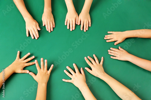 Wallpaper Mural Children hands on blackboard background Torontodigital.ca