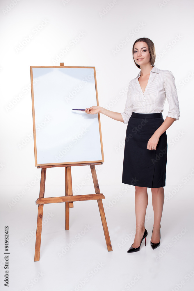 young business woman showing something on the white background young business woman showing something on the white background