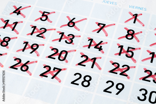 Calendar page with strikethrough days