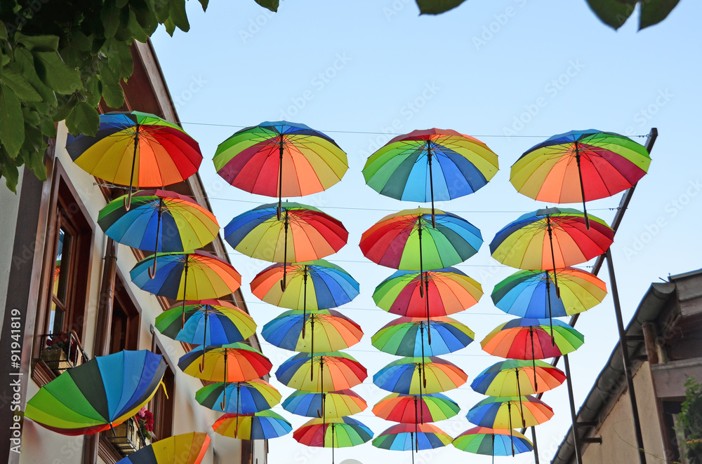 Obraz premium Colorful umbrella on roof