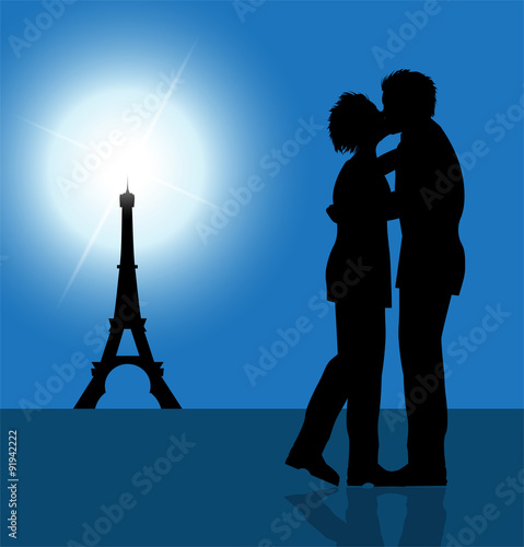 coppia di innamorati che si bacia e torre eiffel sullo sfondo