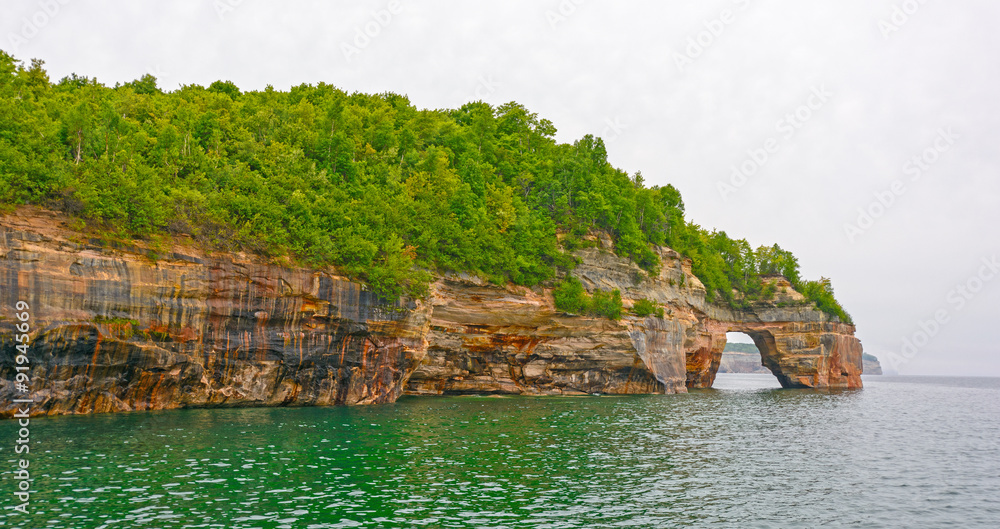 Sea Arch on Colorful Cliffs