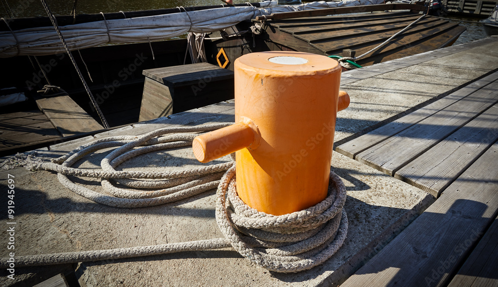 Boat moored to dock