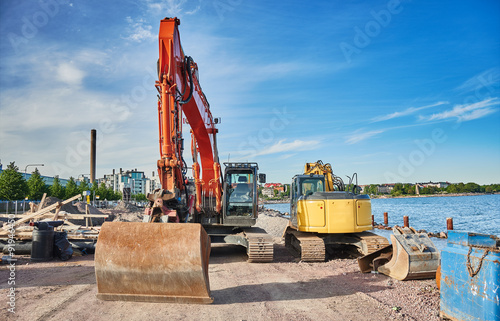 Obraz na płótnie Two excavators in construction site w salonie