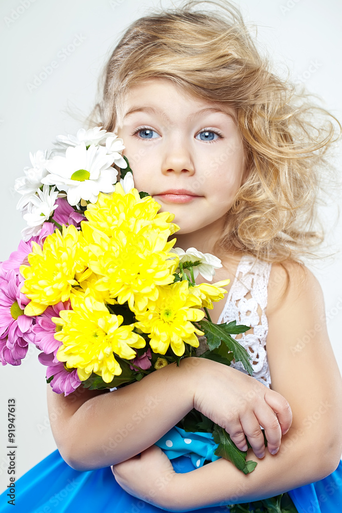 little girl with bouquet of flowers 