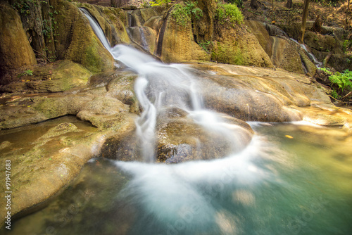 Beautiful flowing waterfall on the rock