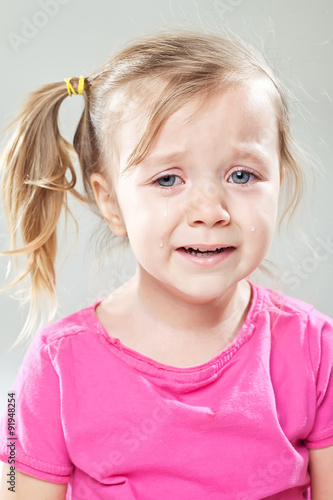 Little girl with tooth pain 