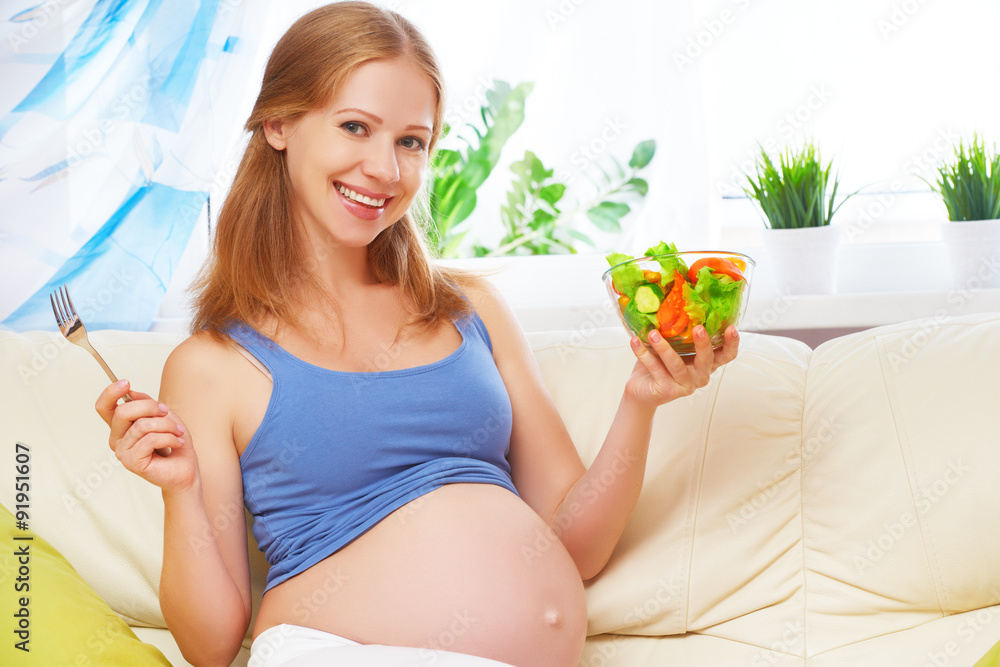 happy pregnant woman eats healthy food vegetable salad happy pregnant woman eats healthy food vegetable salad