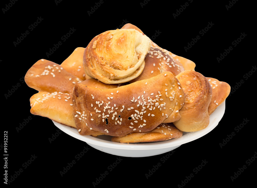 biscuits in a plate on a black background biscuits in a plate on a black background