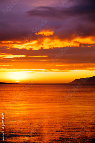 A beautiful midnight sunset seen in Iceland © elxeneize