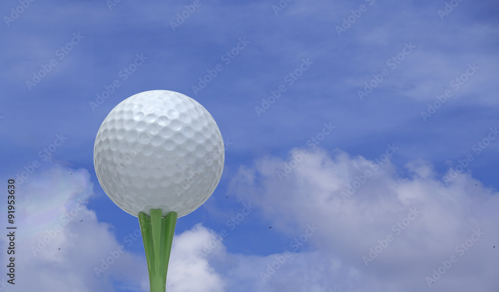 golf ball on a tee over blue sky golf ball on a tee over blue sky