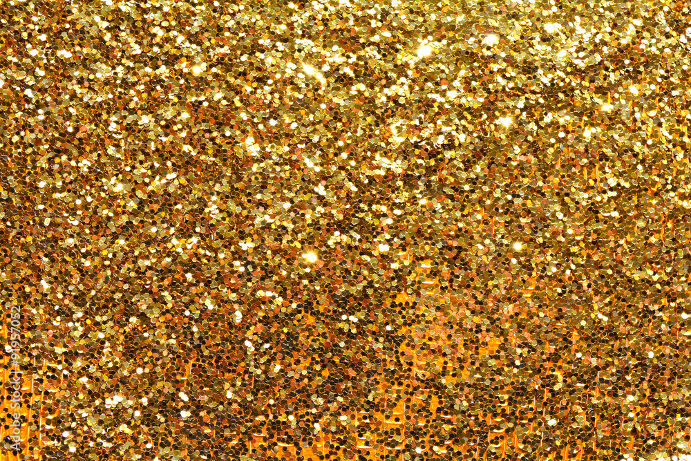 Holiday yellow glitter, gold sand and dust texture. Golden sparkles Holiday yellow glitter, gold sand and dust texture. Golden sparkles