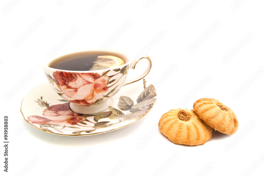 mug of tea with lemon and cookies mug of tea with lemon and cookies