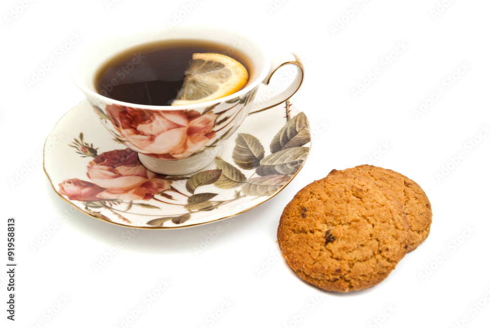 oatmeal cookies and mug of tea with lemon oatmeal cookies and mug of tea with lemon