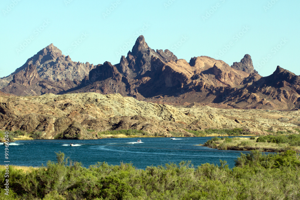 Recreational boats in a bend of the Colorado River near Recreational boats in a bend of the Colorado River near